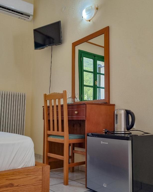 Postel nebo postele na pokoji v ubytování Hotel Spiridoula