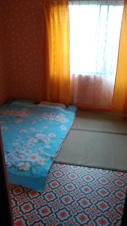 Postel nebo postele na pokoji v ubytování メゾン102号 Mason Guest House Suite 102