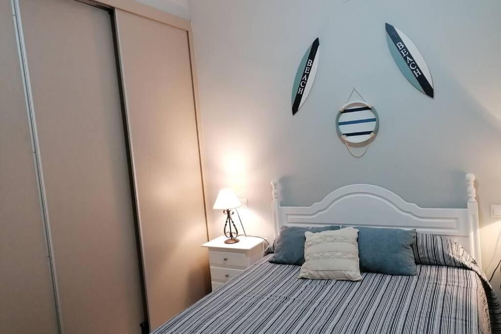 Posteľ alebo postele v izbe v ubytovaní Apartamento 42 Eurosol, a 5 min Carihuela