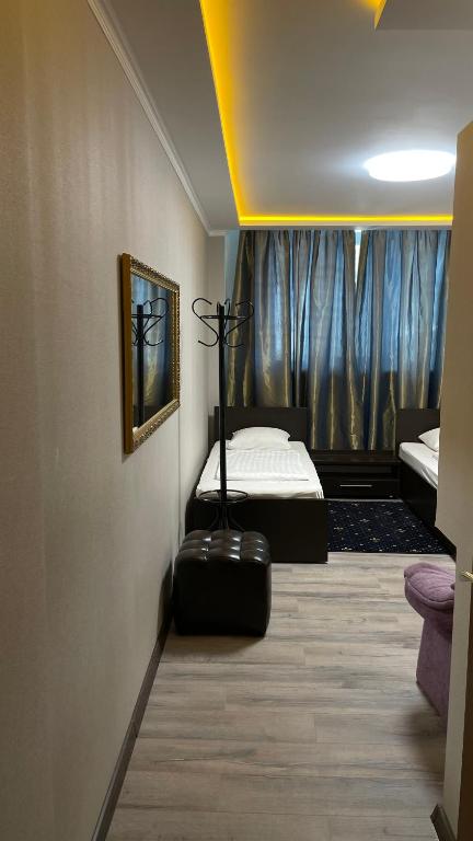 Postel nebo postele na pokoji v ubytování Hotel Style BESSARABIA