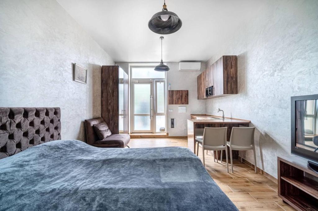 Postel nebo postele na pokoji v ubytování Boomerang apart-apart hotel