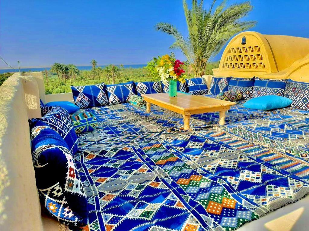 a couch with a table on top at Lemon tree villa in Tunis