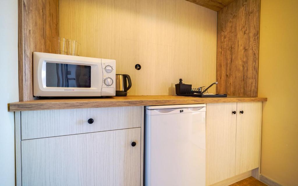 Kuchyňa alebo kuchynka v ubytovaní Apartmány Karmon Park