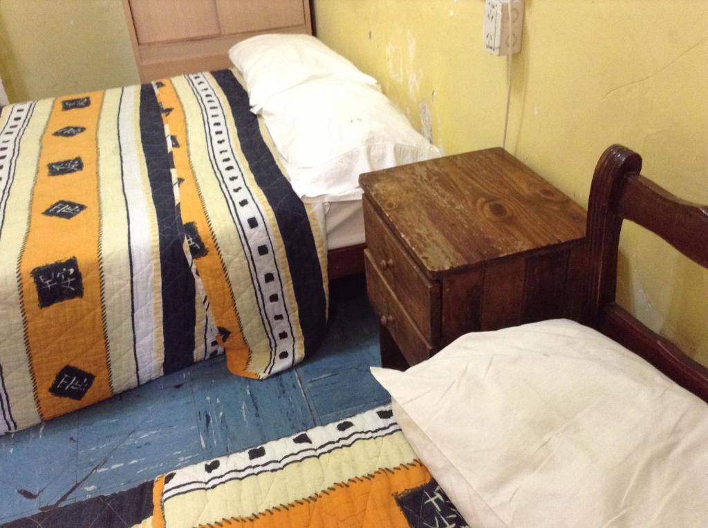 Postel nebo postele na pokoji v ubytování Hotel O'Rei