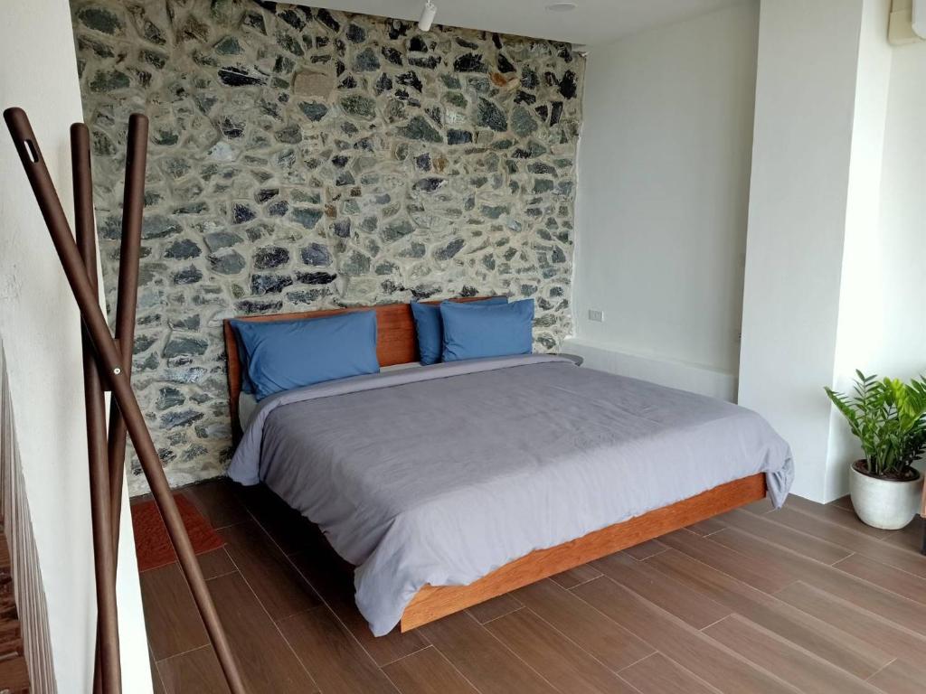 Postel nebo postele na pokoji v ubytování Anatta The Cliff House