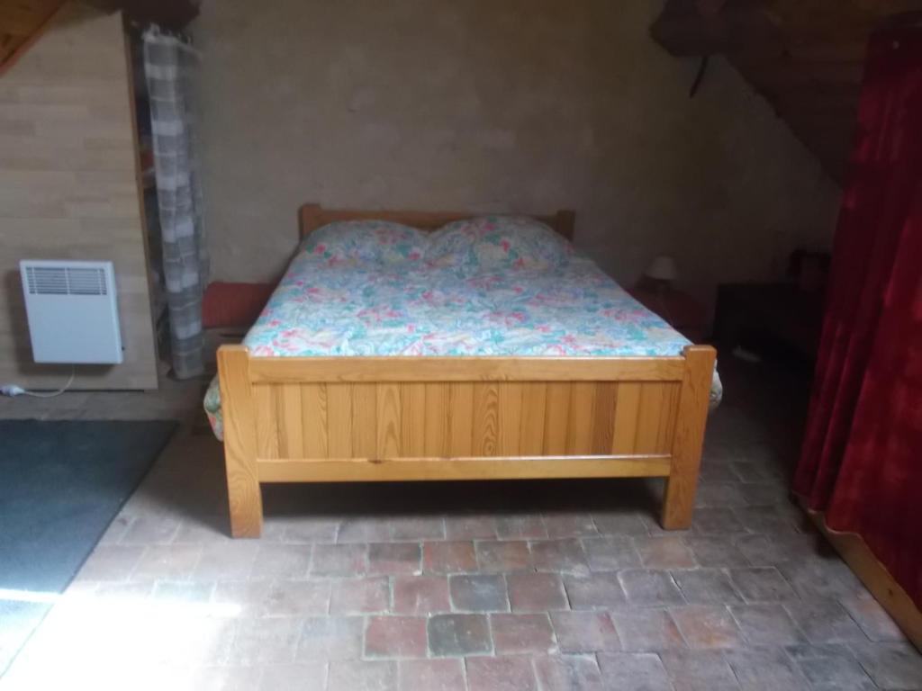 Postel nebo postele na pokoji v ubytování Escale du Morvan