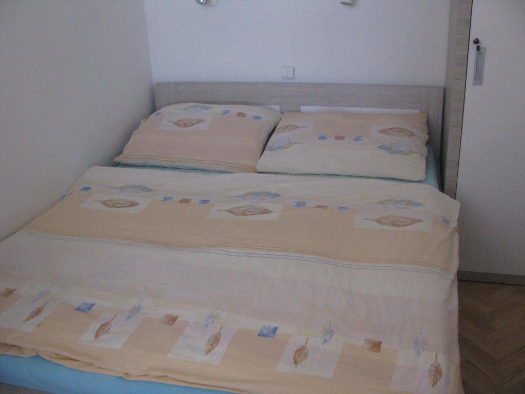 Postel nebo postele na pokoji v ubytování Apartmán Olomouc Ručilova