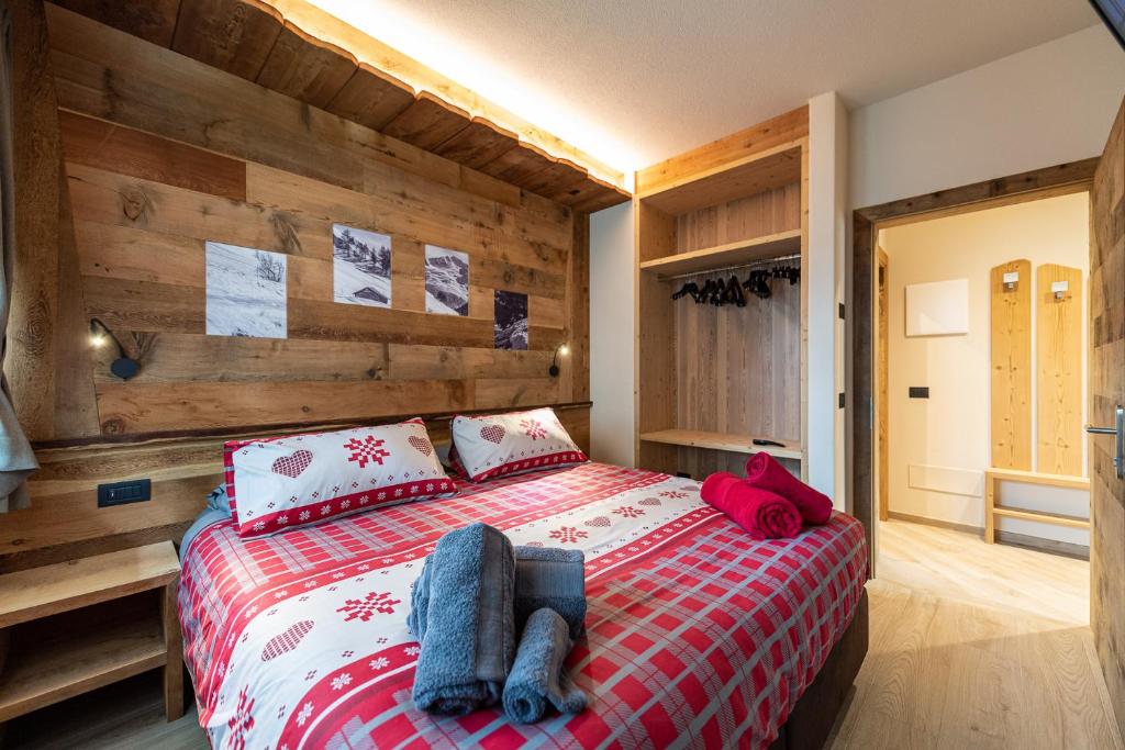 Postel nebo postele na pokoji v ubytování AG Apartments Livigno centro