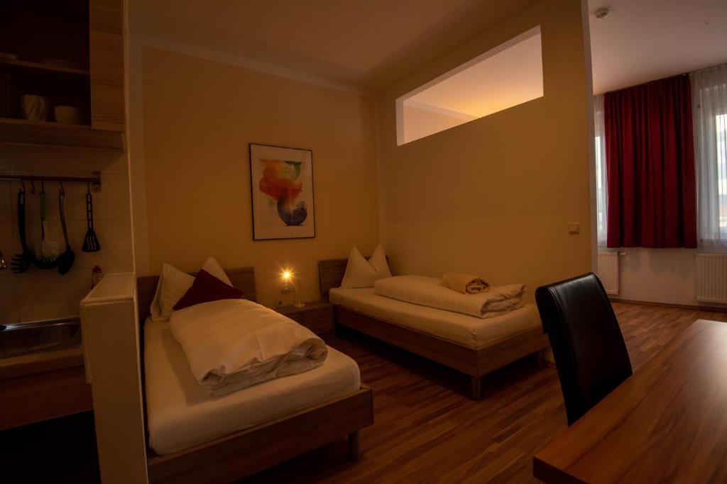 Posteľ alebo postele v izbe v ubytovaní City Appartements Weiz