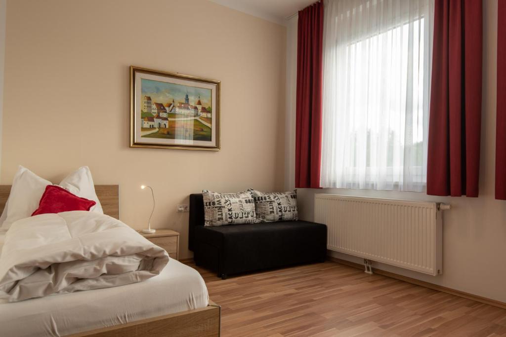 Posteľ alebo postele v izbe v ubytovaní City Appartements Weiz