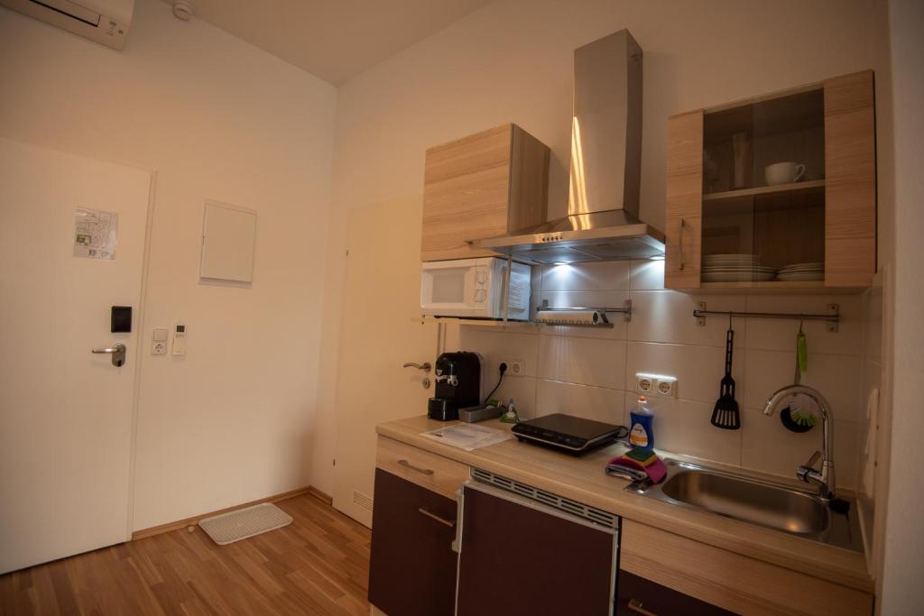 Kuchyňa alebo kuchynka v ubytovaní City Appartements Weiz