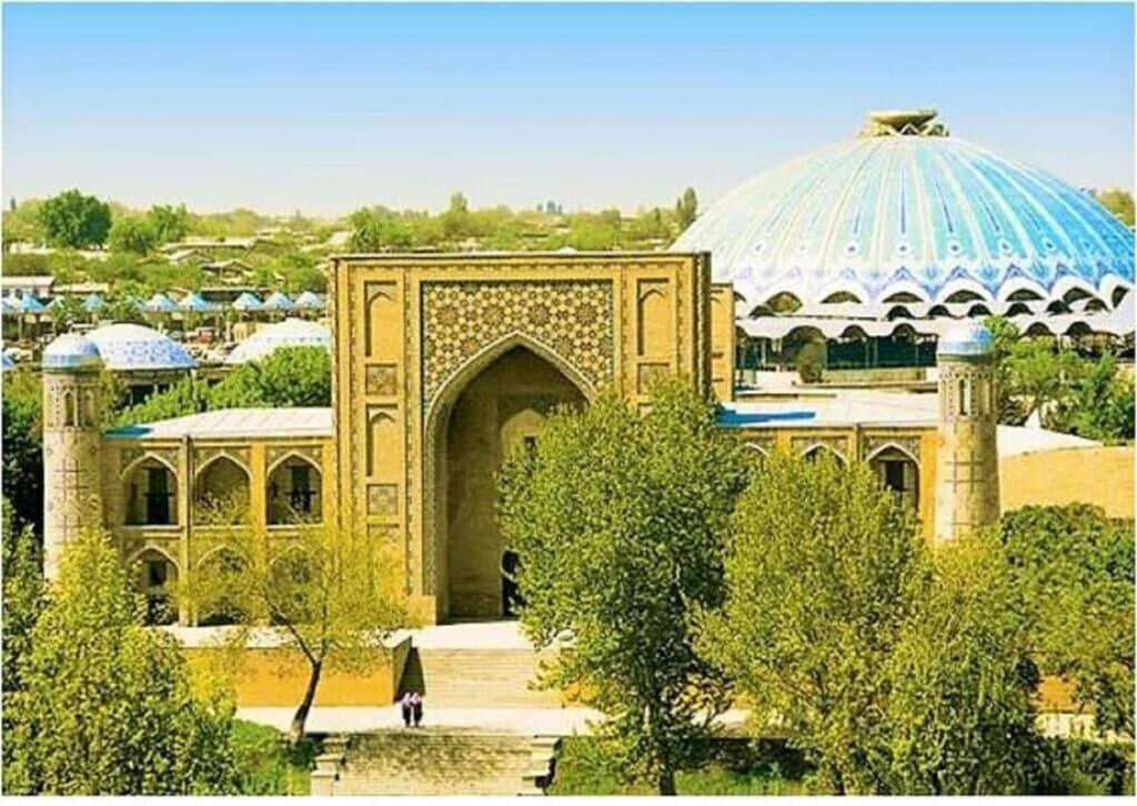 a large building with a dome on top of it at Spacious and Cozy in Tashkent