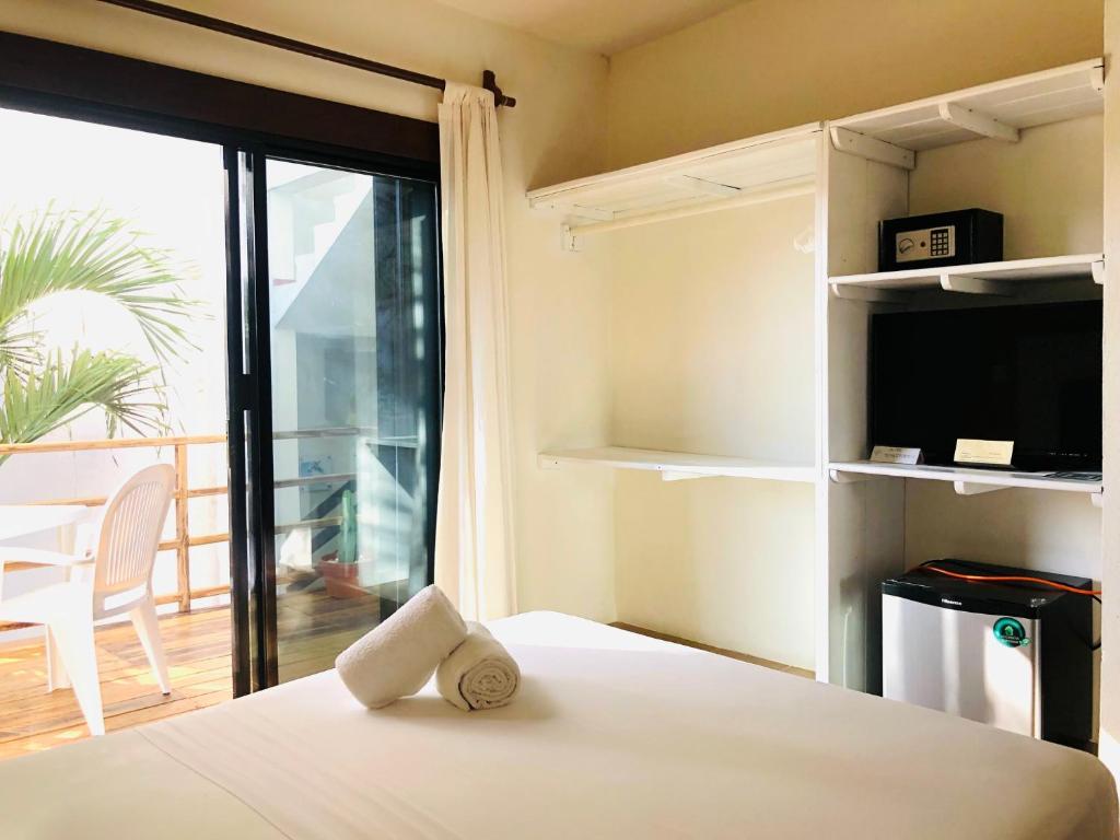 Postel nebo postele na pokoji v ubytování Hotel Boutique Pachamama