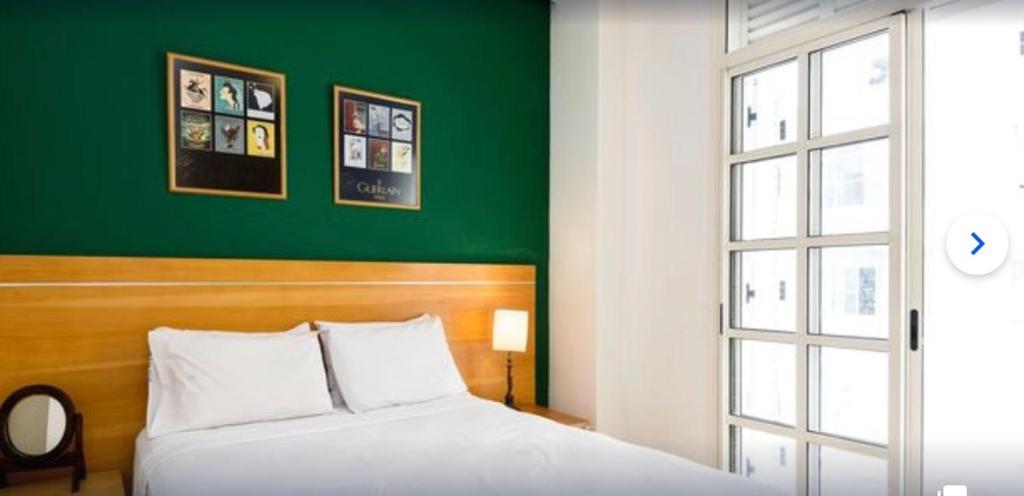 מיטה או מיטות בחדר ב-South Beach Vista Mar Apartamentos