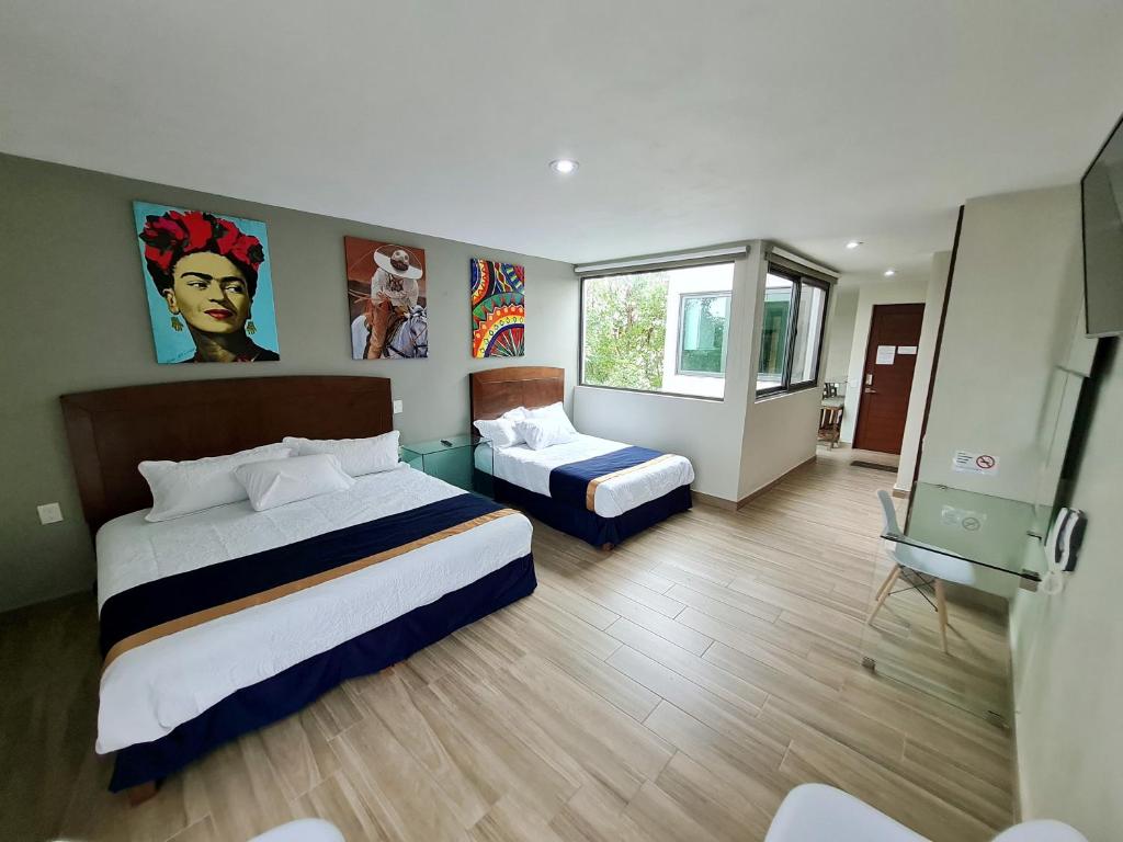 Postel nebo postele na pokoji v ubytování Casa Arandas Hotel - Suits