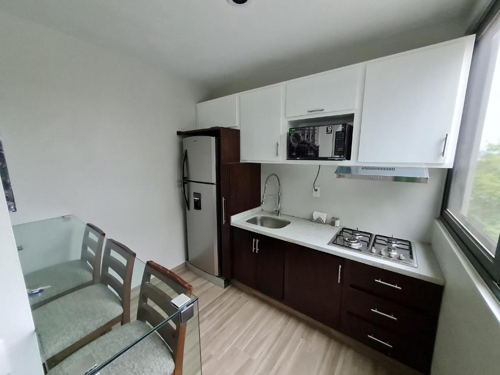 Kuchyň nebo kuchyňský kout v ubytování Casa Arandas Hotel - Suits