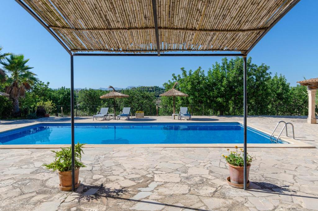 The swimming pool at or close to Finca es Rafal, Agroturisme