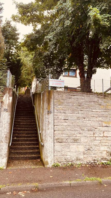 a set of stairs leading up to a building at G.O.D. Ferienwohnung in Bad Mergentheim