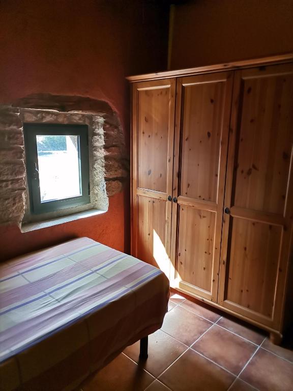 Posteľ alebo postele v izbe v ubytovaní Cal Calçó