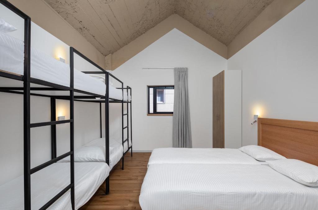 Postel nebo postele na pokoji v ubytování 180 Boutique Hostel