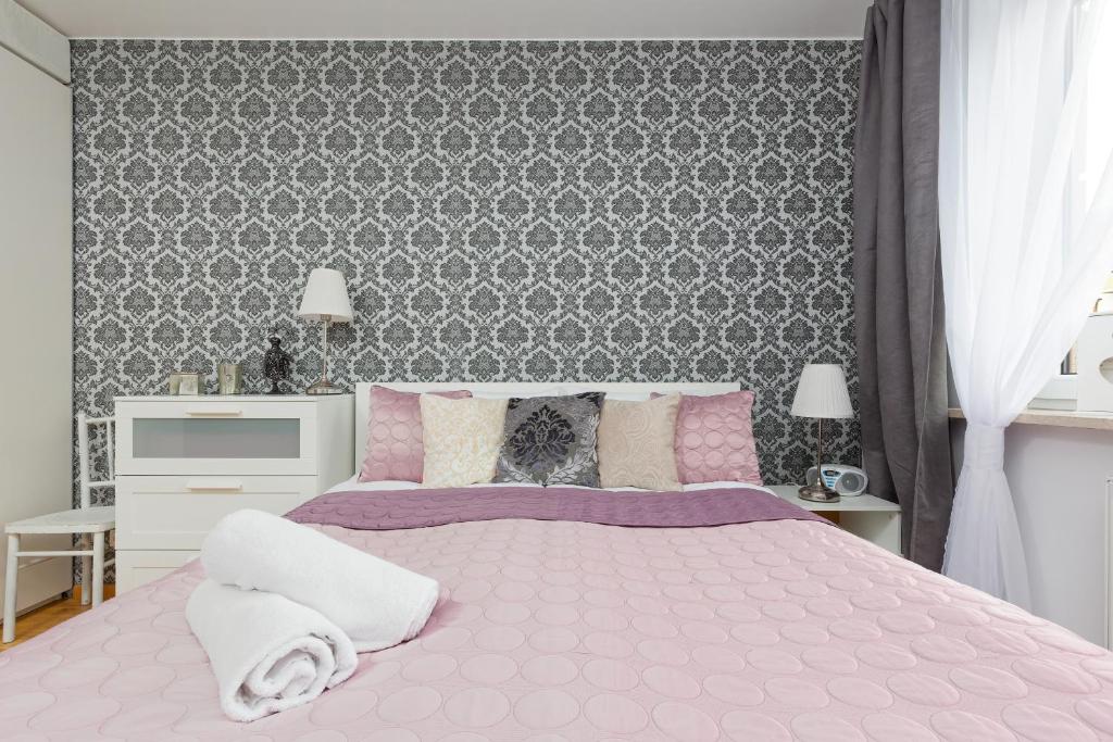 Posteľ alebo postele v izbe v ubytovaní Atrium Ursus Warsaw Apartments by Noclegi Renters