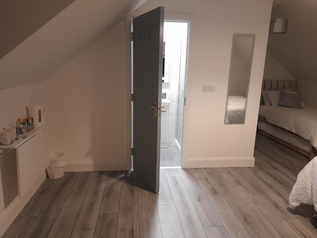 Postel nebo postele na pokoji v ubytování Glenbeg Lodge B&B