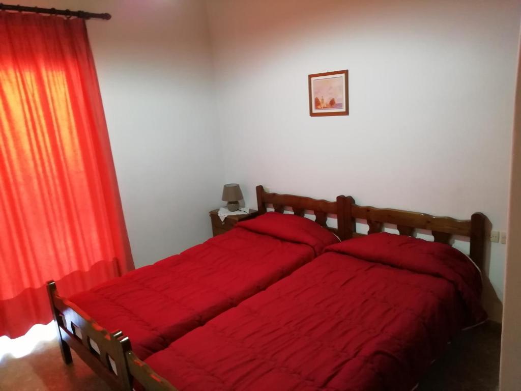 Postel nebo postele na pokoji v ubytování Kastraki Villas