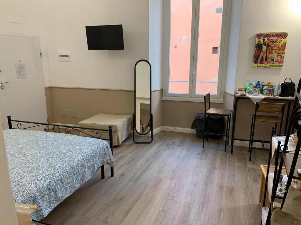 TV a/nebo společenská místnost v ubytování DOMUS L’AUREA
