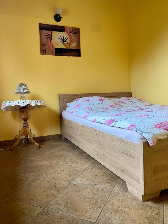 Posteľ alebo postele v izbe v ubytovaní Domek Gościnny