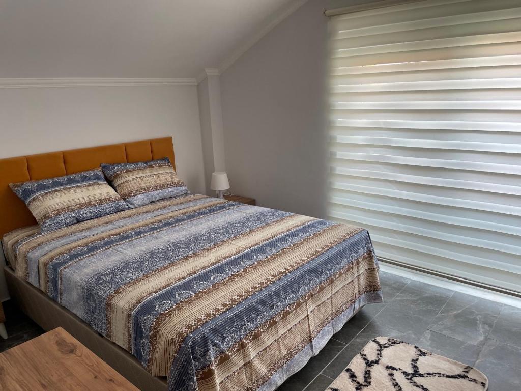 Postel nebo postele na pokoji v ubytování BELKA GOLF RESİDENCE Deluxe apt Poolside BELEK