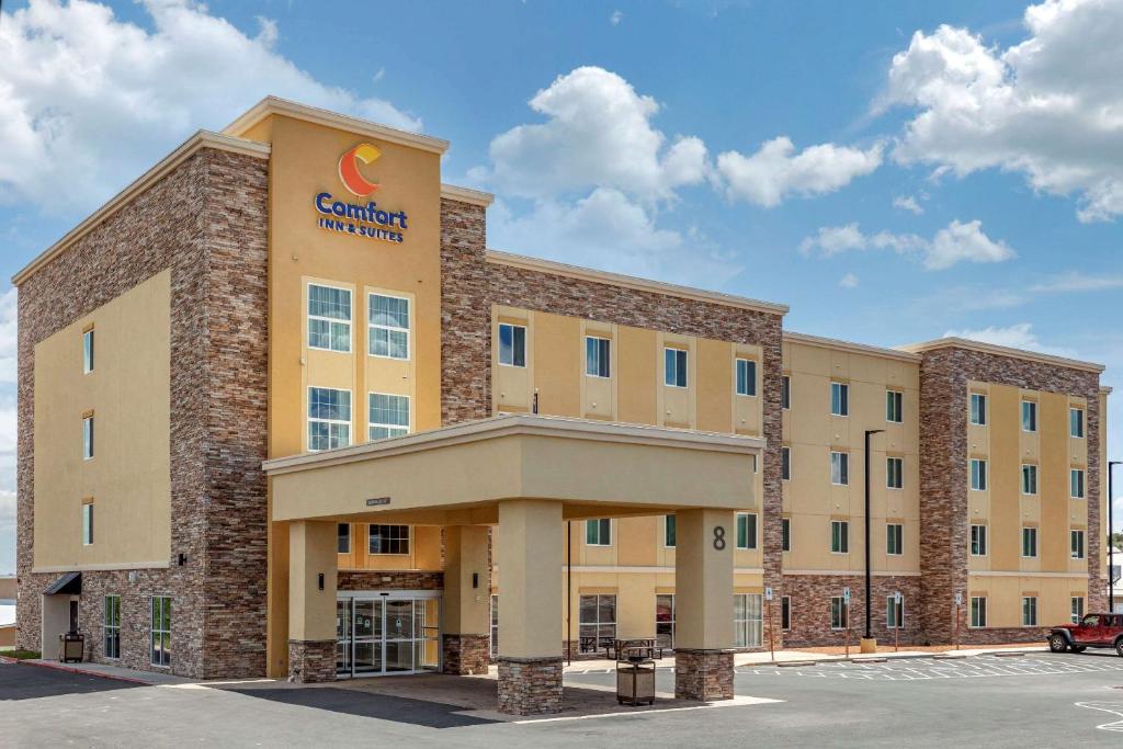 a building with a sign on the front of it at Comfort Inn & Suites in Edgewood