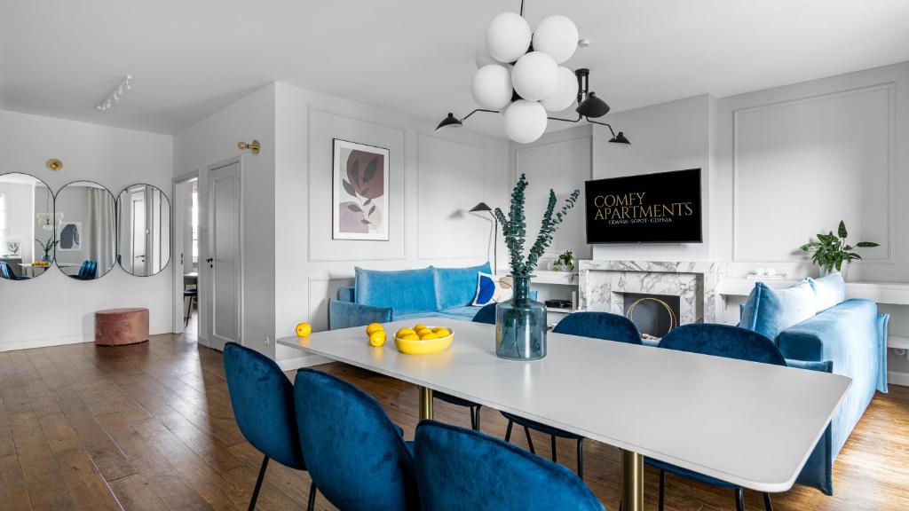 Televízia a/alebo spoločenská miestnosť v ubytovaní Comfy Apartments - Lastadia LUX