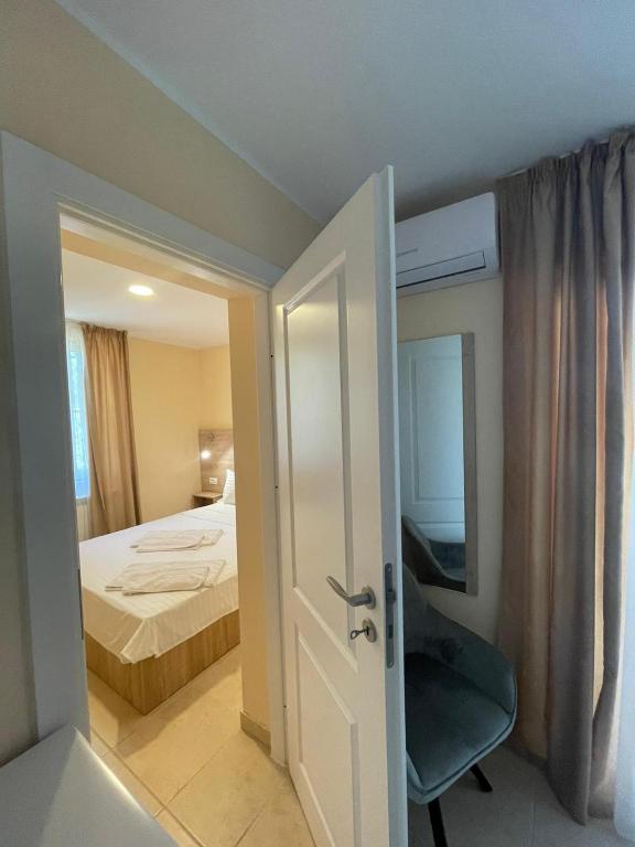 Postel nebo postele na pokoji v ubytování Hotel Olt by Ventura