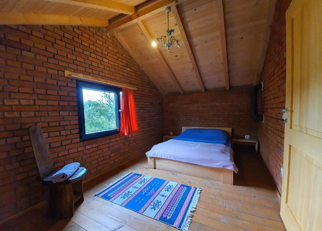 Postel nebo postele na pokoji v ubytování Lura Agroturizem