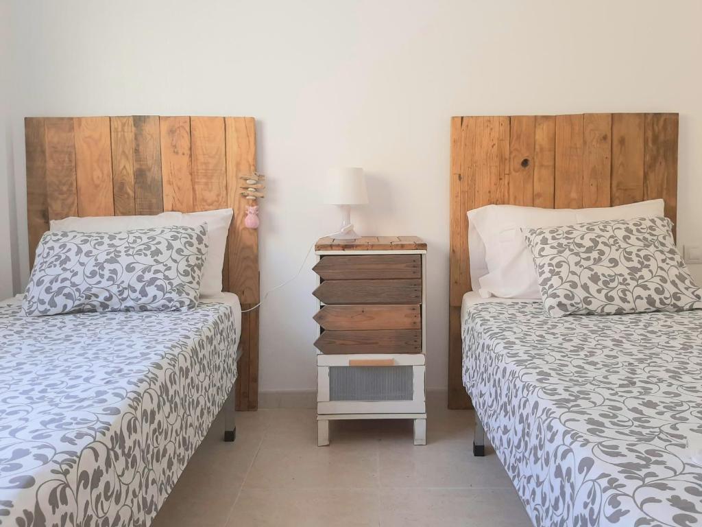 Postel nebo postele na pokoji v ubytování Viento House