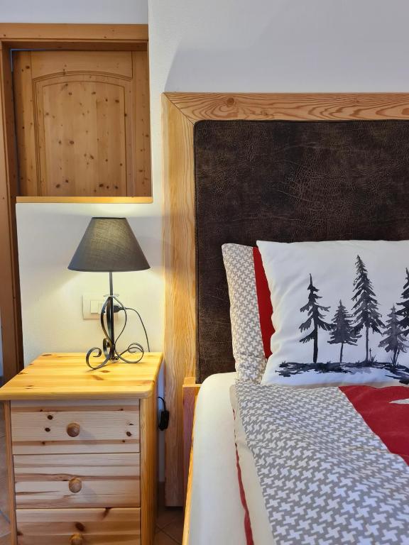 Postel nebo postele na pokoji v ubytování B&B Ai Larici