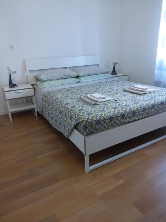 Postel nebo postele na pokoji v ubytování alloggio verona est S. Pietro