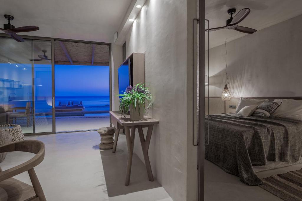Postel nebo postele na pokoji v ubytování Altera cave villas