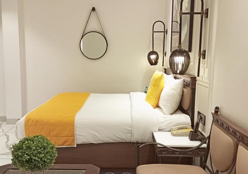 Postel nebo postele na pokoji v ubytování Bloom Boutique l GK-1
