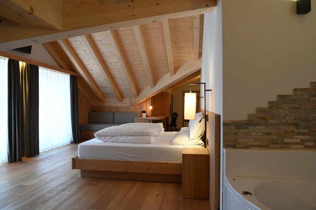 Postel nebo postele na pokoji v ubytování B&B Fontanella