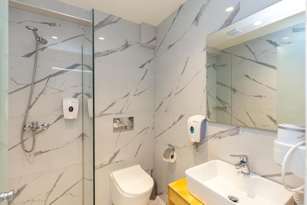 Koupelna v ubytování Aqua Luxury Suites by Estia