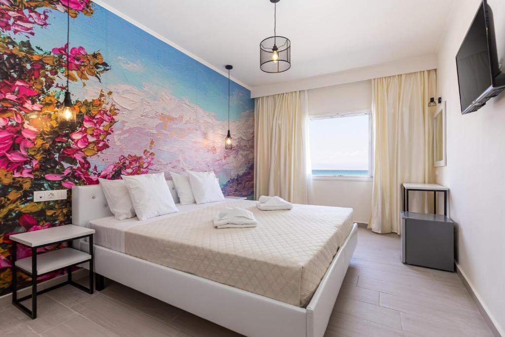 Postel nebo postele na pokoji v ubytování Aqua Luxury Suites by Estia