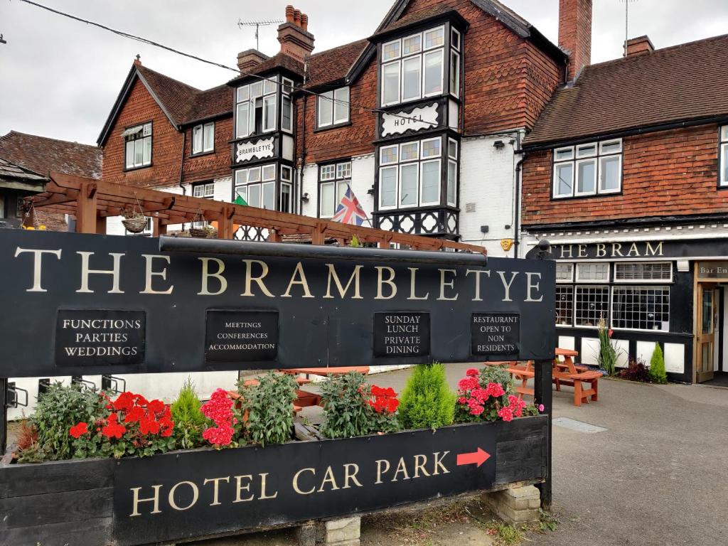 a sign in front of a hotel car park at Brambletye Hotel in Forest Row