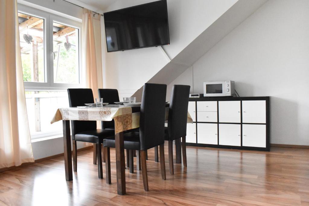 Televízia a/alebo spoločenská miestnosť v ubytovaní Böhmerwald pur - Haus1 mit eigener Sauna!