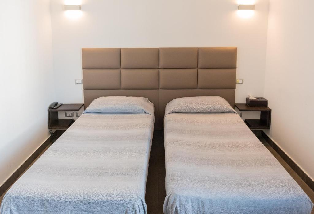 Postel nebo postele na pokoji v ubytování Ex-L