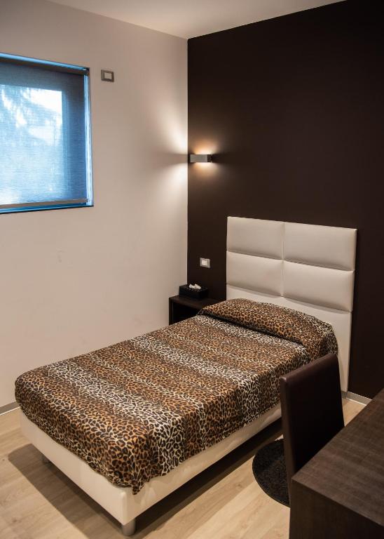 Postel nebo postele na pokoji v ubytování Ex-L