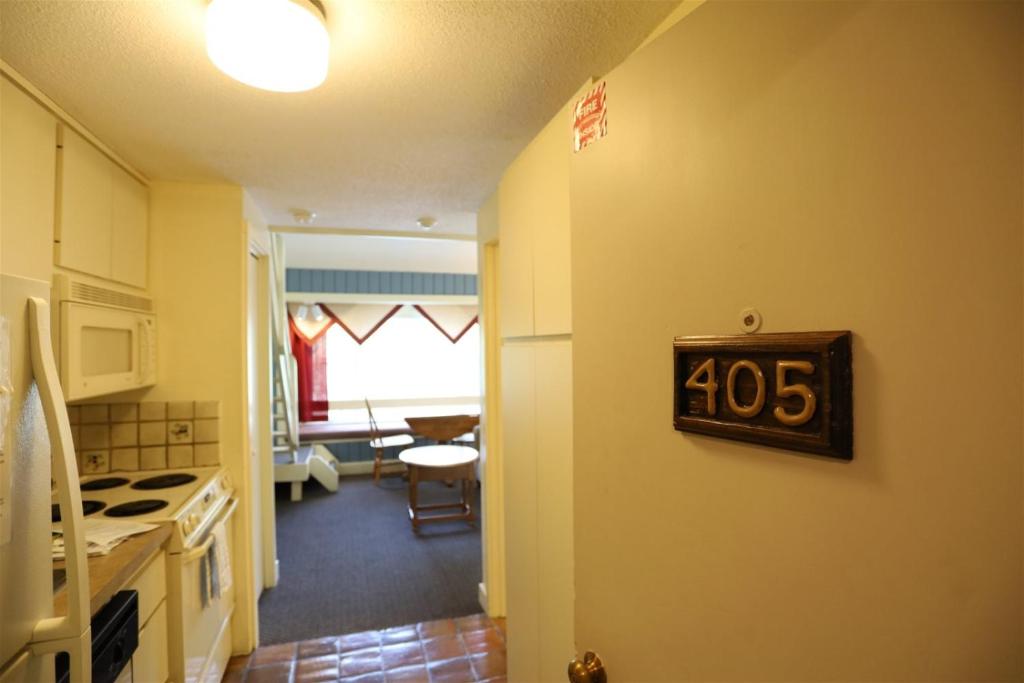 a kitchen with a house number on the wall at Inns Of Wv 405, 1bd, Waterville Valley in Waterville Valley