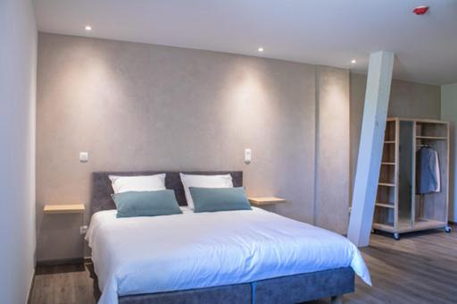 Postel nebo postele na pokoji v ubytování B&B elzartwinning
