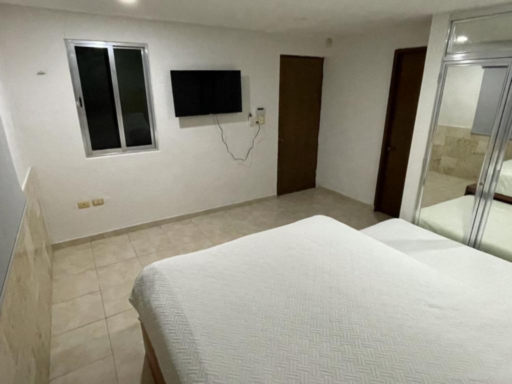 Postel nebo postele na pokoji v ubytování Casa con alberca en el centro de Puerto Progreso