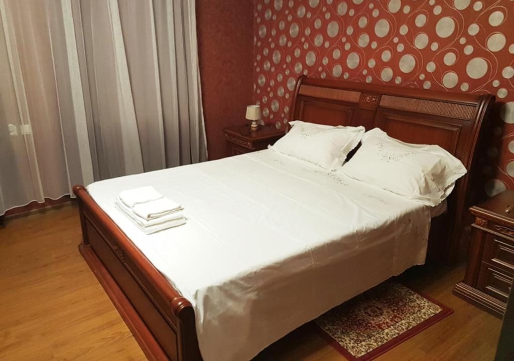 Postel nebo postele na pokoji v ubytování Guest House AMO